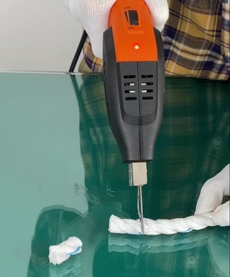 Taglierina calda del tessuto del panno della corda di raffreddamento a aria tenuto in mano elettrica